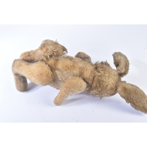 89 - A mid 20th Century vintage soft toy teddy bear in the form of a Hare / Bunny Rabbit. Firmly stuffed ... 