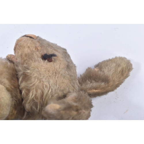 89 - A mid 20th Century vintage soft toy teddy bear in the form of a Hare / Bunny Rabbit. Firmly stuffed ... 