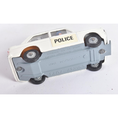 9 - Two vintage Corgi Toys diecast model Police cars. Both No. 506 Police ' Panda ' IMP with lumius door... 