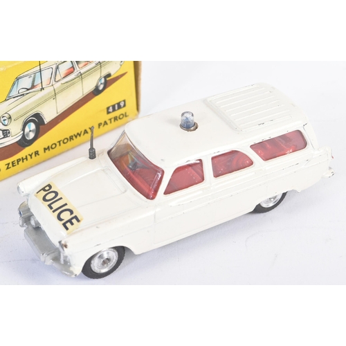 91 - A vintage Corgi Toys diecast model No. 419 Ford Zephyr Motorway Patrol car. The model with cream bod... 