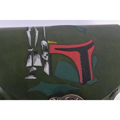 76 - Estate of Jeremy Bulloch - Star Wars - a fan-made Boba Fett themed leather pouch. Dyed green leather... 