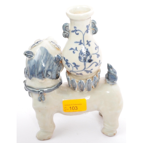 103 - A vintage 20th century ceramic pottery Asian Chinese figure of a Fu Dog with stem vase in blue and w... 