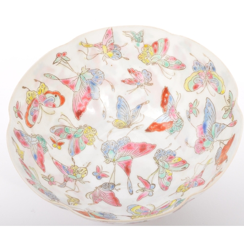 111 - A 19th century Chinese hand painted eggshell porcelain dish being butterflies in flight. Character m... 