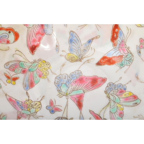 111 - A 19th century Chinese hand painted eggshell porcelain dish being butterflies in flight. Character m... 