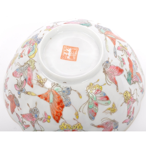 111 - A 19th century Chinese hand painted eggshell porcelain dish being butterflies in flight. Character m... 