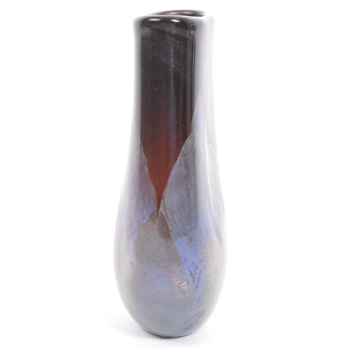 122 - A vintage 20th century circa. 1970's azurine glass vase in blue and metallic colourways. Unmarked. I... 