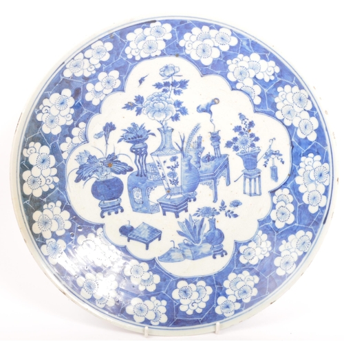 123 - Two vintage 20th century Asian Chinese oriental blue and white charger display plates. One with tran... 