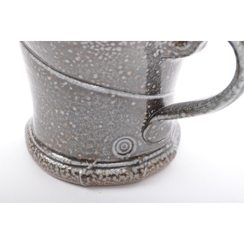 128 - Walter Keeler (b. 1945) A 20th century Walter Keeler studio pottery salt glazed earthenware mug. Pot... 