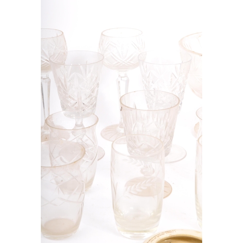 137 - An early 20th century collection of cut glass drinking wares. The collection to include wine glasses... 