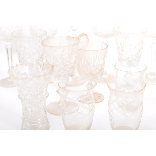 137 - An early 20th century collection of cut glass drinking wares. The collection to include wine glasses... 