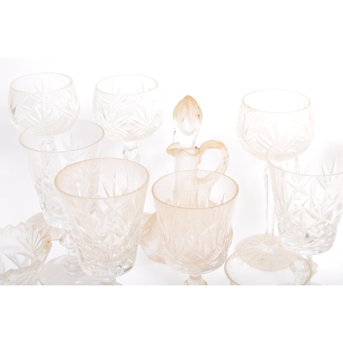 137 - An early 20th century collection of cut glass drinking wares. The collection to include wine glasses... 