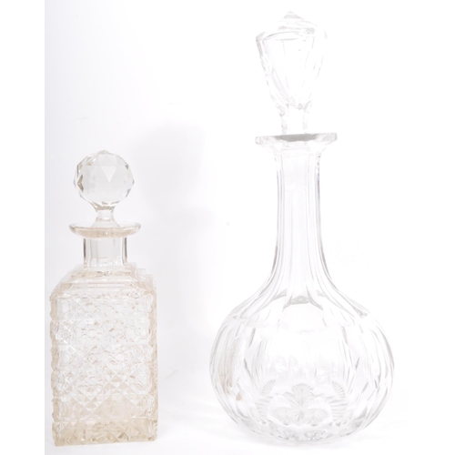 143 - A collection of 19th century and later glass decanters to include cut glass decanters alongside an e... 