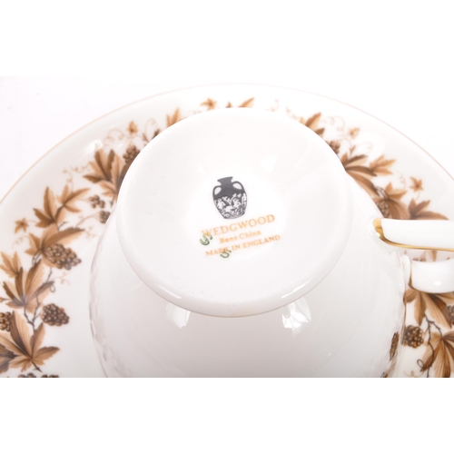 147 - A vintage, retro Wedgwood Autumn Vine porcelain dinner and tea service comprising cups, saucers, pla... 