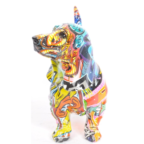 154 - A contemporary resin multicolour graffiti street art urban Basset hound sausage dog ornament figurin... 