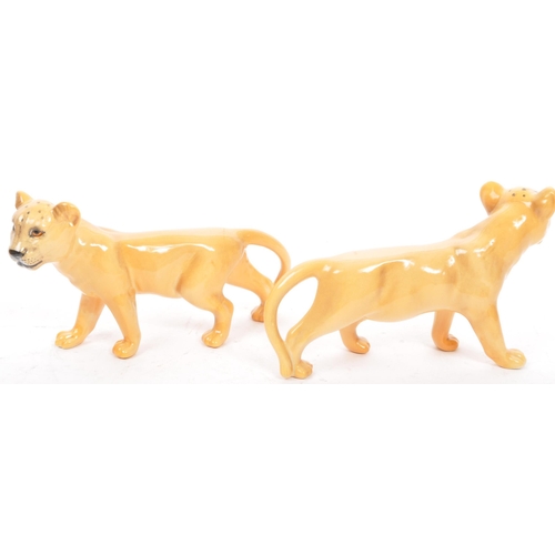 156 - A collection of vintage 20th century Beswick ceramic figurines. Comprising of Lion, Lioness and a pa... 