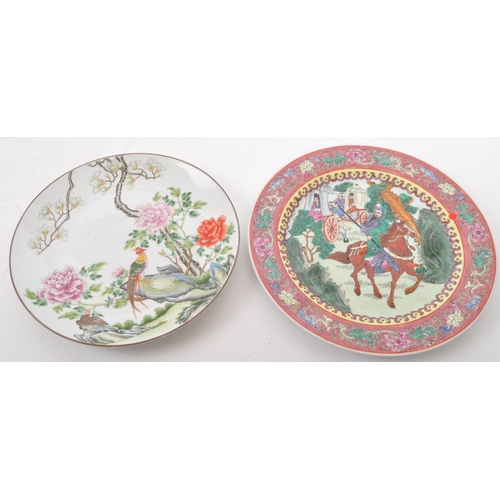 159 - A collection of mid 20th century Asian Chinese oriental china porcelain display plates. Comprising o... 