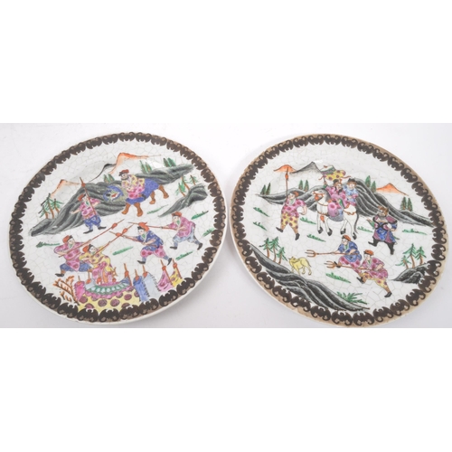 159 - A collection of mid 20th century Asian Chinese oriental china porcelain display plates. Comprising o... 