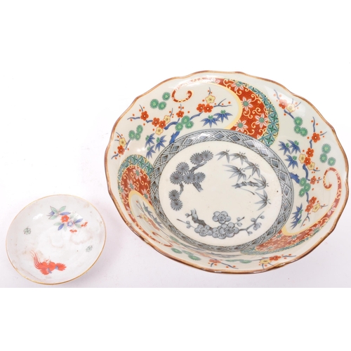 159 - A collection of mid 20th century Asian Chinese oriental china porcelain display plates. Comprising o... 