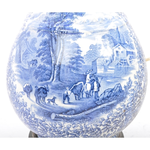 175 - An early 20th century blue and white ceramic pottery lamp base. With light fixing to top, tapering n... 