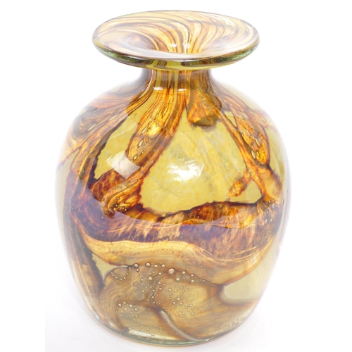 176 - A retro vintage mid 20th century Mdina studio art glass vases. With lipped circular top into a taper... 