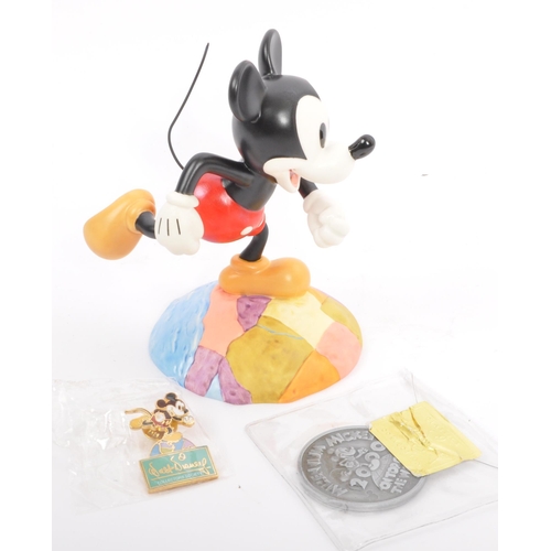 181 - Classics Walt Disney Collections - Four painted porcelain figurine / statues comprising of; Mickey M... 