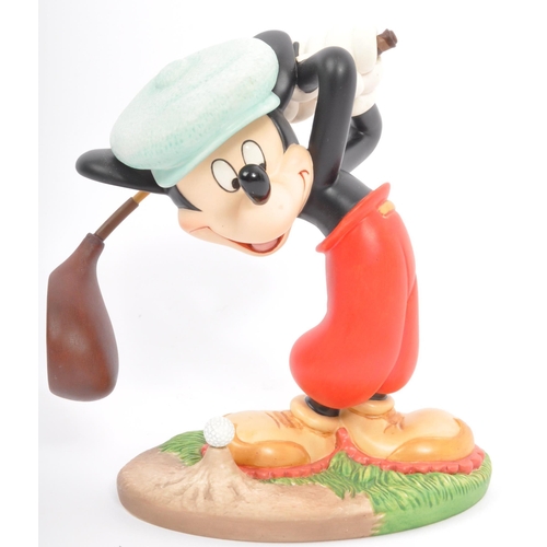 181 - Classics Walt Disney Collections - Four painted porcelain figurine / statues comprising of; Mickey M... 