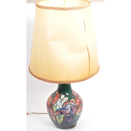 182 - A vintage 20th century Moorcroft bone china hand painted desk table lamp base with shade in the 'Orc... 