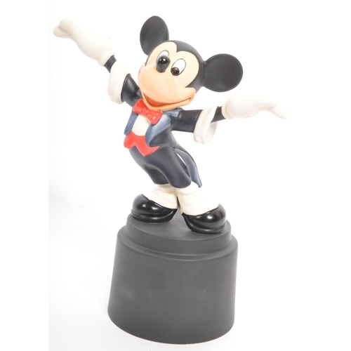 192 - Classics Walt Disney Collections - Four painted porcelain figurine / statues comprising of; Mickey M... 