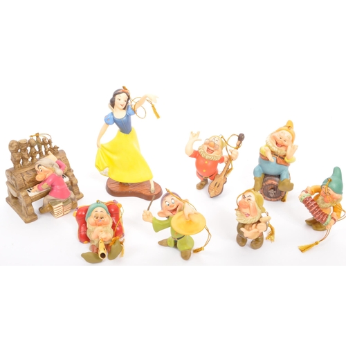 194 - Classics Walt Disney Collections - Ten painted porcelain figurine / statues comprising of; Snow Whit... 