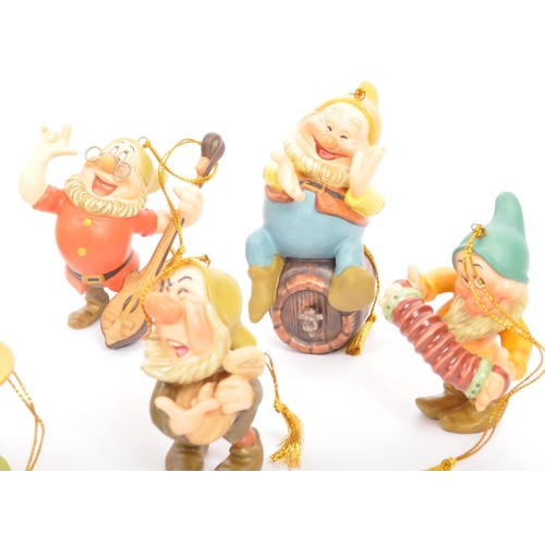 194 - Classics Walt Disney Collections - Ten painted porcelain figurine / statues comprising of; Snow Whit... 