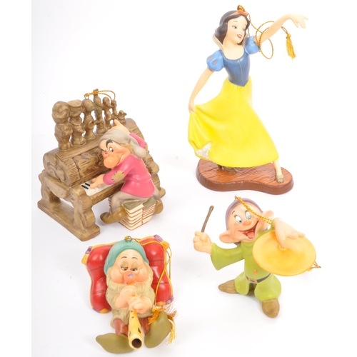 194 - Classics Walt Disney Collections - Ten painted porcelain figurine / statues comprising of; Snow Whit... 