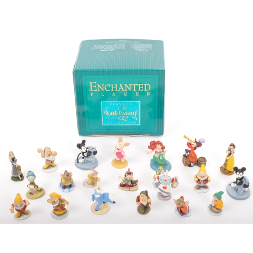 202 - Classic Walt Disney Collection - Enchanted Place - A collection of miniature statue / figurines comp... 