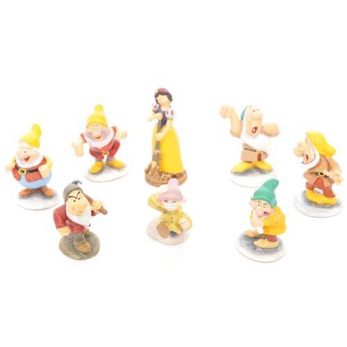 202 - Classic Walt Disney Collection - Enchanted Place - A collection of miniature statue / figurines comp... 