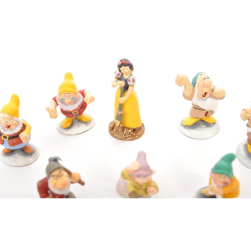 202 - Classic Walt Disney Collection - Enchanted Place - A collection of miniature statue / figurines comp... 