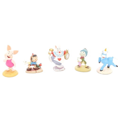 202 - Classic Walt Disney Collection - Enchanted Place - A collection of miniature statue / figurines comp... 