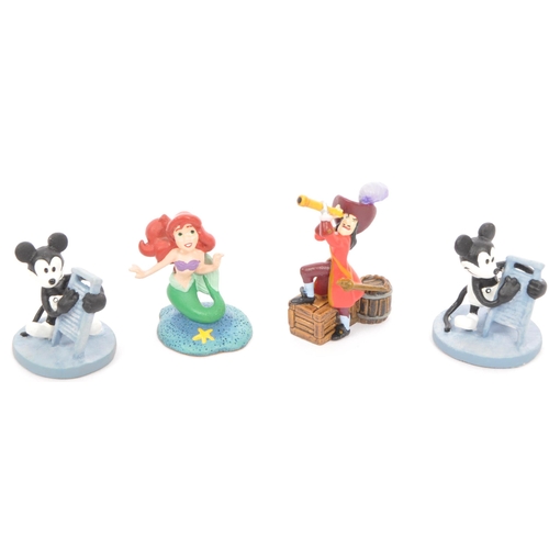 202 - Classic Walt Disney Collection - Enchanted Place - A collection of miniature statue / figurines comp... 