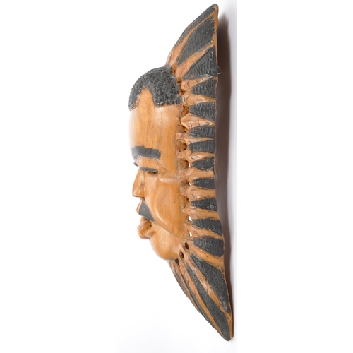 206 - A Contemporary East African Malawi wall face mask carving with detailed features with ebonised detai... 