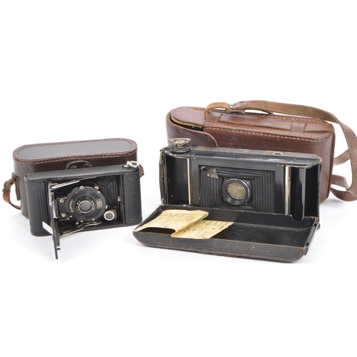 213 - A vintage 20th century circa 1930sÂ Zeiss Ikon Ikonette cantilever camera, together with a Jcarette ... 