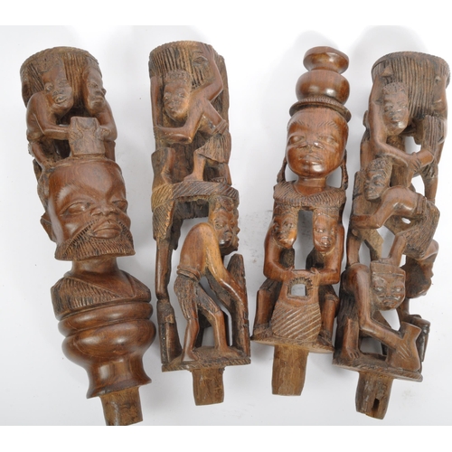 223 - A collection of 20th century African ands Asian carved hardwood figures and ornaments.