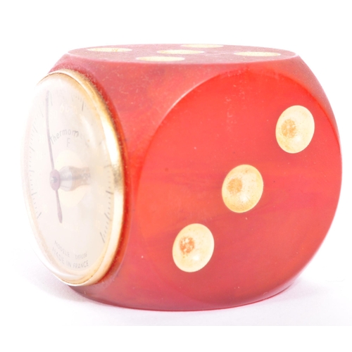 226 - A vintage mid 20th century French Rolux Bakelite thermometer in the form of a dice. Accompanied by a... 