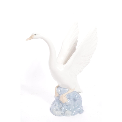 23 - Nao - A large collection of vintage 20th century Spanish porcelain figurines in the form of animals ... 