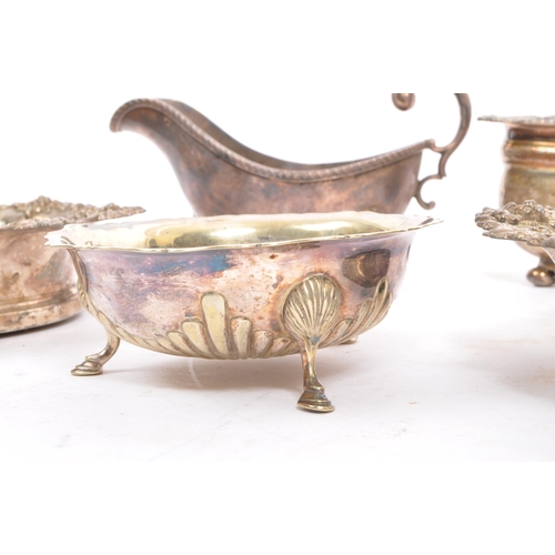 235 - A collection of silver plated items to include tureens, gallery edged silver salver tray, sugar bowl... 