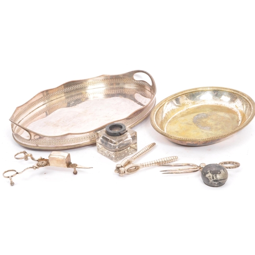 235 - A collection of silver plated items to include tureens, gallery edged silver salver tray, sugar bowl... 