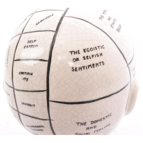 244 - A Victorian manner painted phrenology head in the manner of Fowler. Typical form with painted detail... 