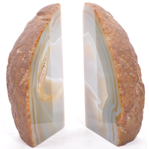 253 - A pair of 20th century Brazilian agate book ends. Each measuring approx. 18 x 10 x 5cm.