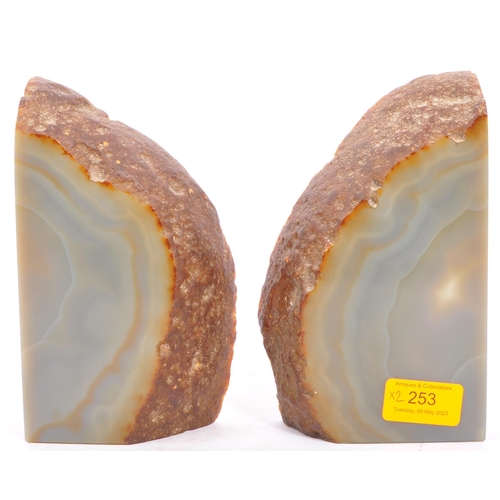 253 - A pair of 20th century Brazilian agate book ends. Each measuring approx. 18 x 10 x 5cm.