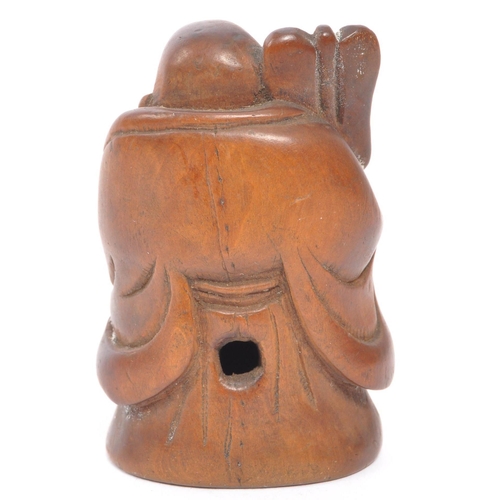 255 - A 20th century Japanese fruitwood buddha netsuke being hand carved and depicted holdingÂ khakkhara. ... 