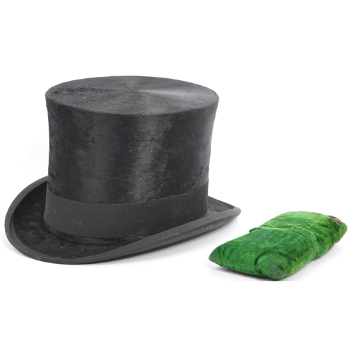 262 - A 19th / early 20th century Christys' of London silk top hat. In a black colourway with curved sides... 