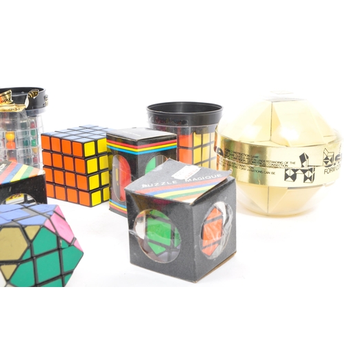 263 - A collection of retro vintage 20th century Rubik's cube and other puzzle games. Comprising of; Ninte... 