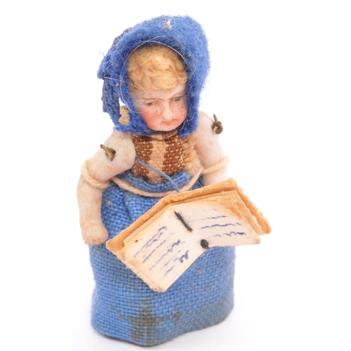 268 - 2 19th century miniature porcelain dolls with lace clothing and bonnets having articulated arms and ... 